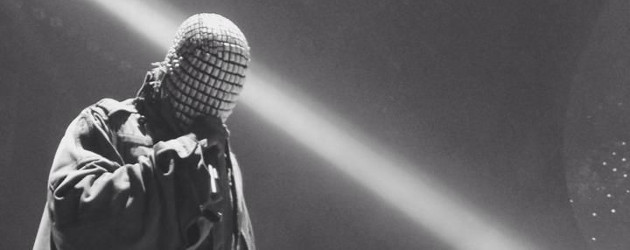 Masked rapper with his mic, in black and white